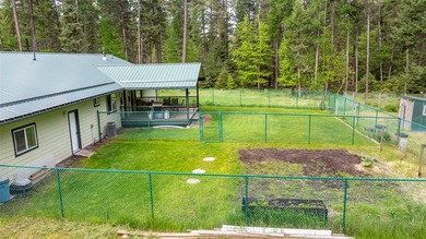Nestled among the Larch and Douglas Fir Trees sits this charming - photo 45