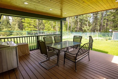 Nestled among the Larch and Douglas Fir Trees sits this charming - photo 46