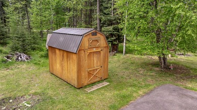 Nestled among the Larch and Douglas Fir Trees sits this charming - photo 48