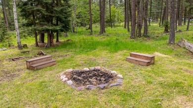 Nestled among the Larch and Douglas Fir Trees sits this charming - photo 49