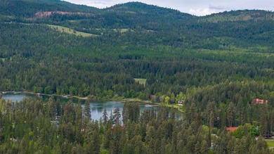 Nestled among the Larch and Douglas Fir Trees sits this charming - photo 54