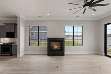 Experience panoramic lake living at its finest. This