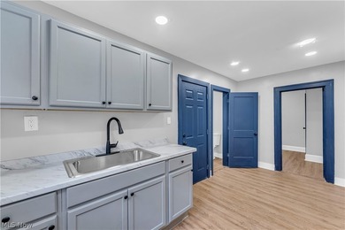 Fully renovated duplex offering modern updates, strong rental - photo 11