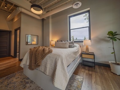 Experience luxury riverfront living at Iron Bridge Condominiums - photo 12
