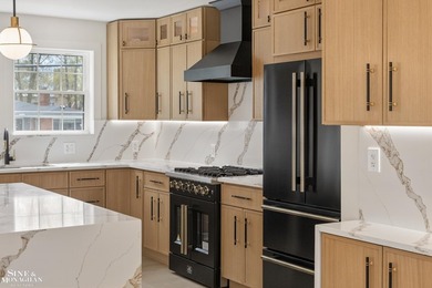 Completely reimagined and renovated to perfection, this stunning - photo 18
