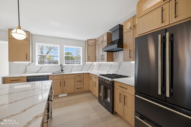 Completely reimagined and renovated to perfection, this stunning - photo 23