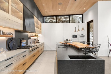 A landmark of contemporary mountain architecture, this - photo 9