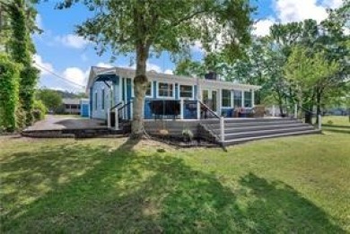 Waterfront home w/level lot & boat dock - Lake Home For Sale in Fair Play, South Carolina
