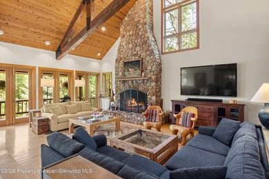 A rare riverfront retreat in Woody Creek, this elegant mountain - photo 1