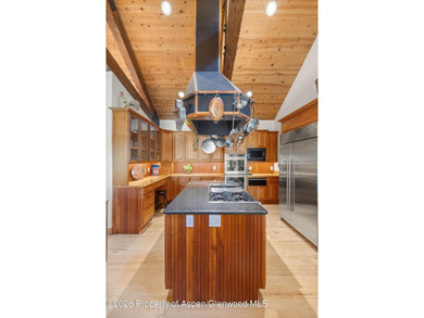 A rare riverfront retreat in Woody Creek, this elegant mountain - photo 9