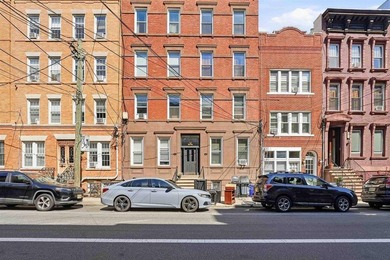 Spacious and bright uptown 2-bedroom, 1-bath home featuring high - photo 12