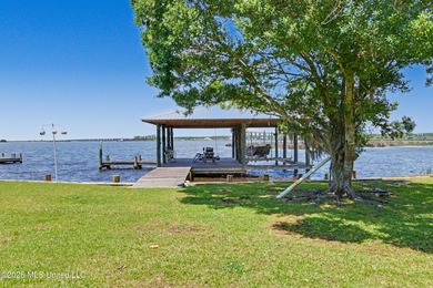 Beautiful Deep Waterfront home with a large pier and covered - photo 28