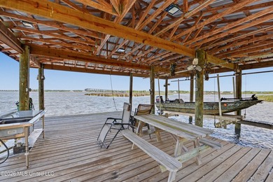 Beautiful Deep Waterfront home with a large pier and covered - photo 29