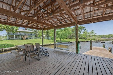 Beautiful Deep Waterfront home with a large pier and covered - photo 30