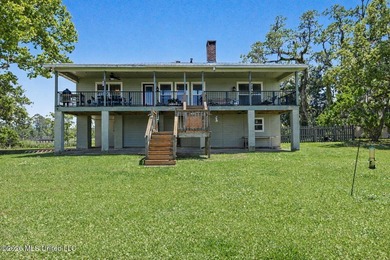 Beautiful Deep Waterfront home with a large pier and covered - photo 32