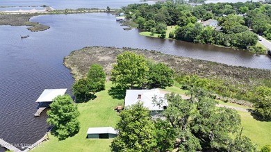 Beautiful Deep Waterfront home with a large pier and covered - photo 35