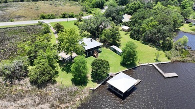 Beautiful Deep Waterfront home with a large pier and covered - photo 38