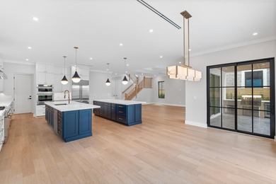 Experience sophisticated new coastal contemporary construction - photo 29