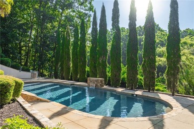 A private cul-de-sac setting on a spring-fed, seven-acre pond - photo 3