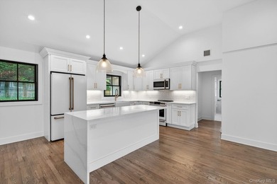 *No expense spared at this meticulously renovated two-level - photo 13