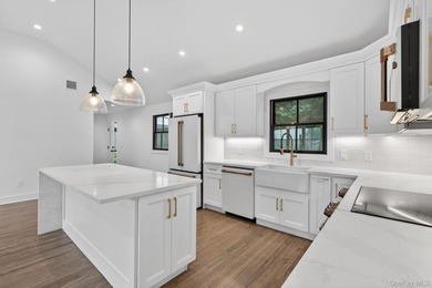 *No expense spared at this meticulously renovated two-level - photo 14