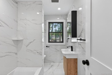 *No expense spared at this meticulously renovated two-level - photo 20