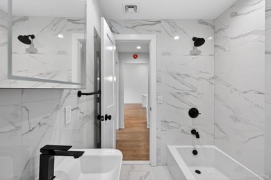 *No expense spared at this meticulously renovated two-level - photo 21