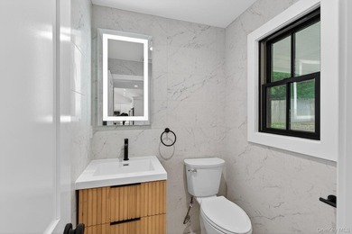 *No expense spared at this meticulously renovated two-level - photo 22