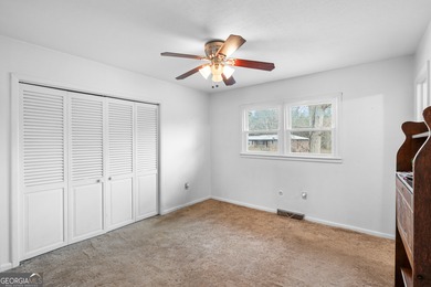 This four-sided brick, one-level home offers 3 bedrooms and 1.5