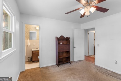 This four-sided brick, one-level home offers 3 bedrooms and 1.5