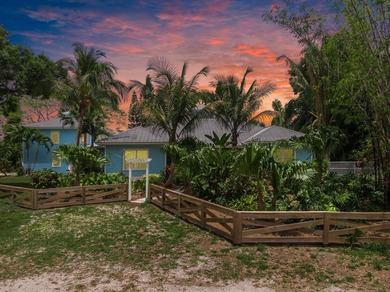 Experience timeless luxury and laid-back elegance on this gated - photo 2