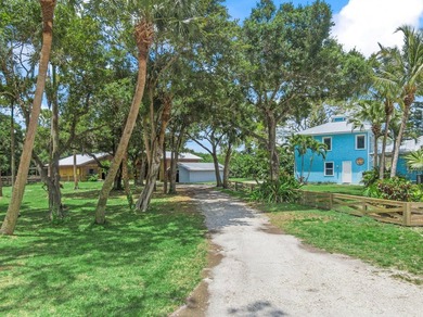 Experience timeless luxury and laid-back elegance on this gated - photo 6