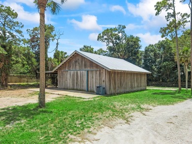 Experience timeless luxury and laid-back elegance on this gated - photo 9