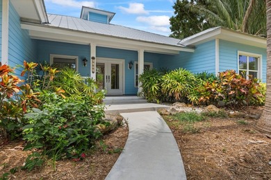 Experience timeless luxury and laid-back elegance on this gated - photo 10