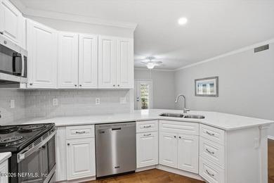 Welcome Home... to this Immaculate Fully Renovated condo on the - photo 11