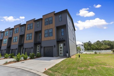 Discover modern coastal living at 30 North Townhomes, a - photo 2