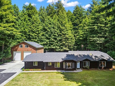 2,049 SQ FT HOME WITH A 3-STORY 3,242 SQ FT SHOP SPACE ON 1.46 - photo 1