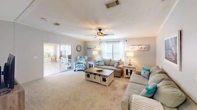 Trade the daily grind for water views, warm breezes and a home - photo 4