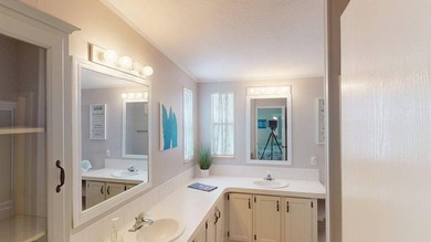 Trade the daily grind for water views, warm breezes and a home - photo 10