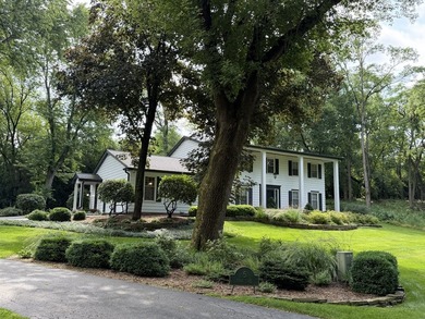 ONCE IN A LIFETIME OPPORTUNITY LOCATED ON A PRIVATE WOODED - photo 1