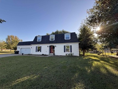 Welcome to 1910 Lakeshore Drive, located in the beautiful and - Lake Home For Sale in Madisonville, Kentucky