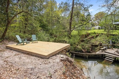 Private waterfront sanctuary on Sandy Creek! This rare 1-acre - photo 3