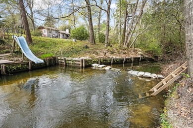 Private waterfront sanctuary on Sandy Creek! This rare 1-acre - photo 4