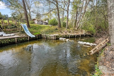 Private waterfront sanctuary on Sandy Creek! This rare 1-acre - photo 5