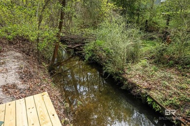 Private waterfront sanctuary on Sandy Creek! This rare 1-acre - photo 7