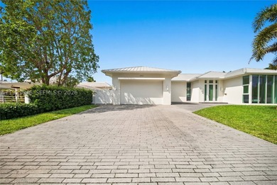 Experience elevated waterfront living in the prestigious Coral - photo 2