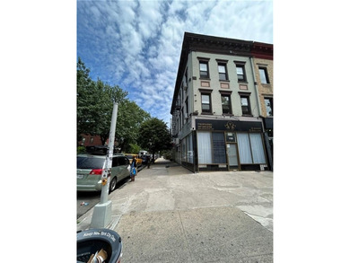 This property really makes a statement on the corner of Nostrand - photo 3