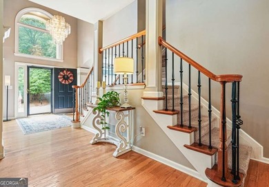 Welcome home to this spacious four-bedroom - photo 3