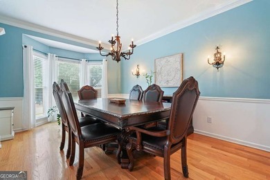 Welcome home to this spacious four-bedroom - photo 8