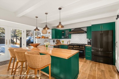 This five bedroom West Aspen retreat blends the warmth of a - photo 6